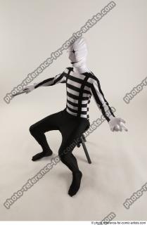 18 2019 01 JIRKA SITTING POSE WITH GUN